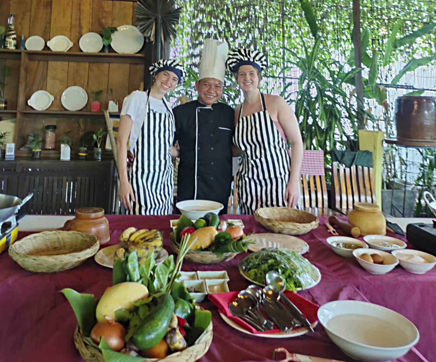 Cooking class participants learning Khmer cuisine
